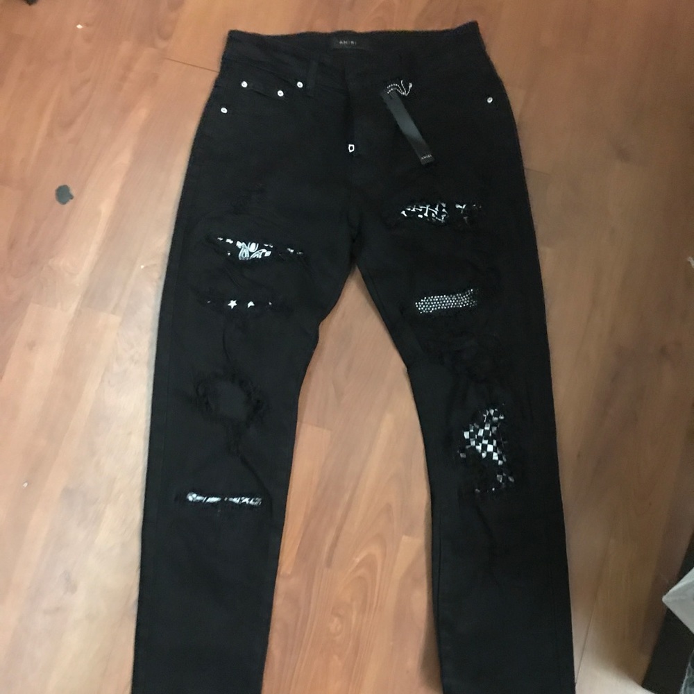 Black Amiri skinny jeans